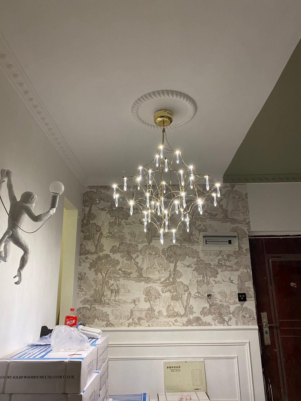 Cyrorella lámpara de araña de acero inoxidable y cristal