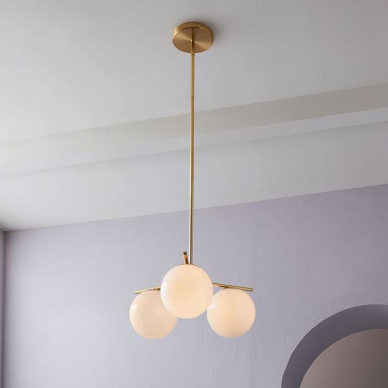 Casoella lámpara de araña esfera y tallo moderna dorada LED