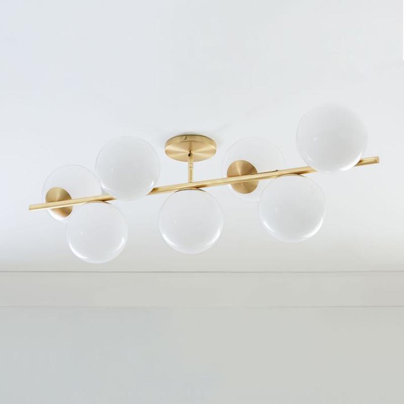 Casoella lámpara de araña esfera y tallo moderna dorada LED