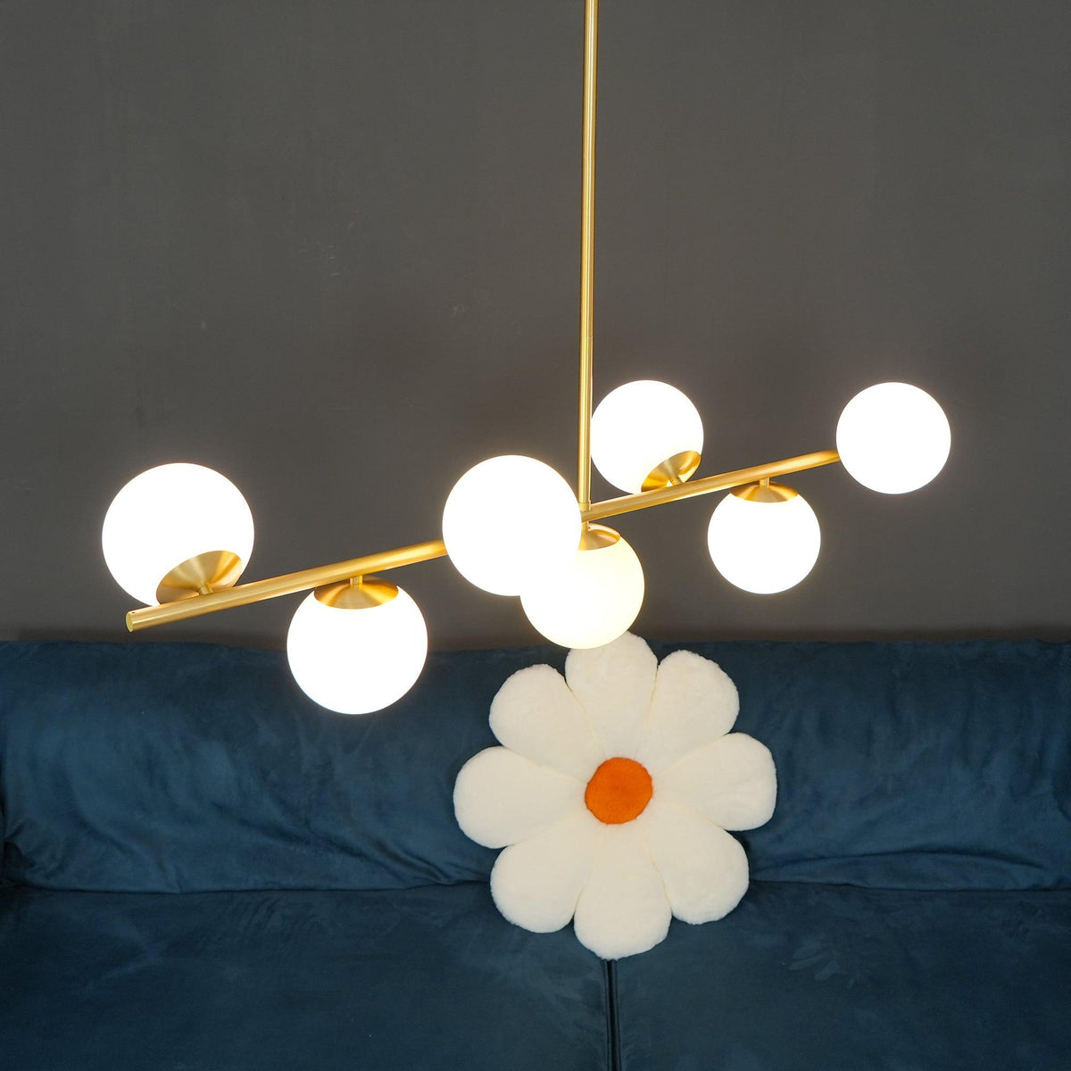 Casoella lámpara de araña esfera y tallo moderna dorada LED