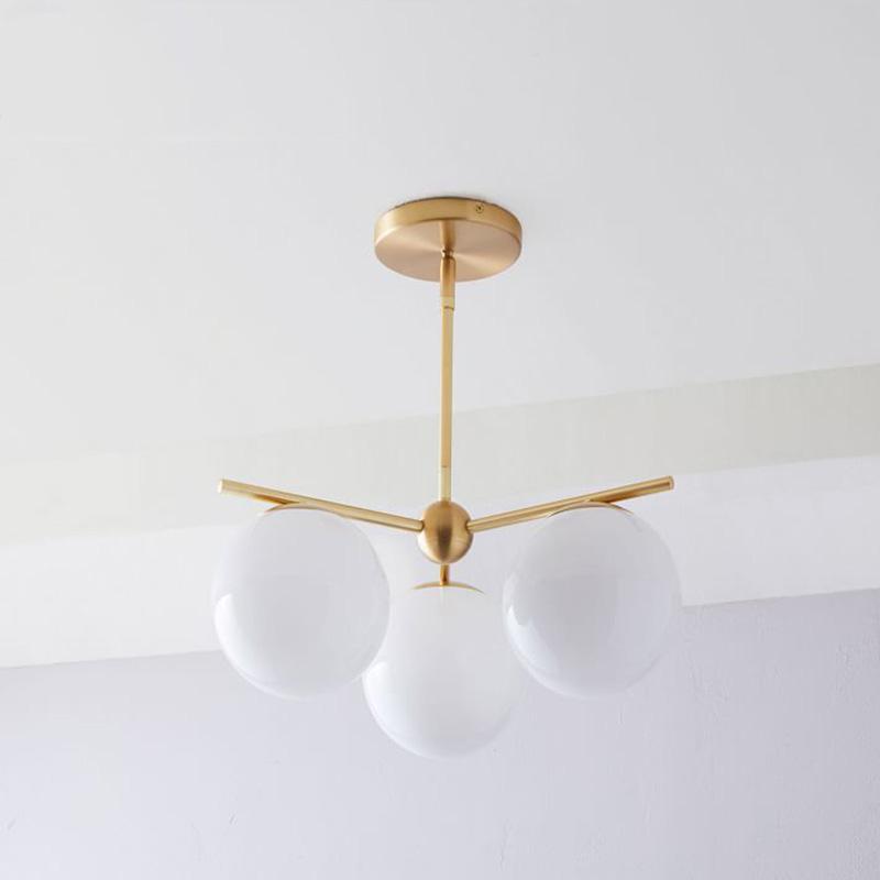 Casoella lámpara de araña esfera y tallo moderna dorada LED