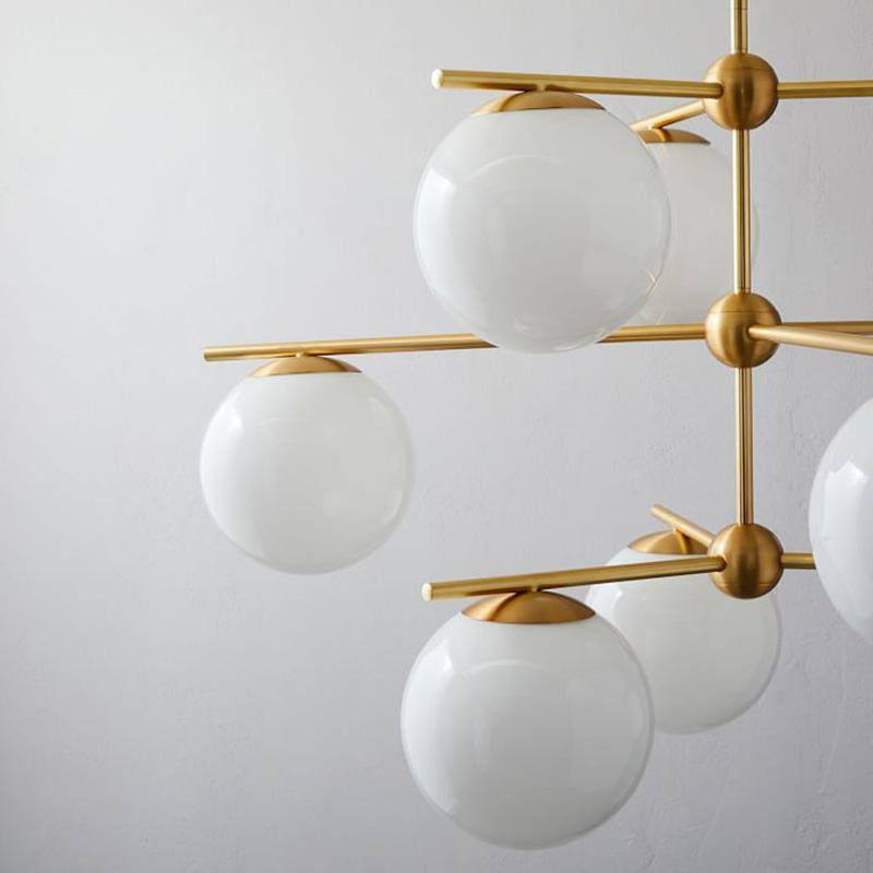 Casoella lámpara de araña esfera y tallo moderna dorada LED