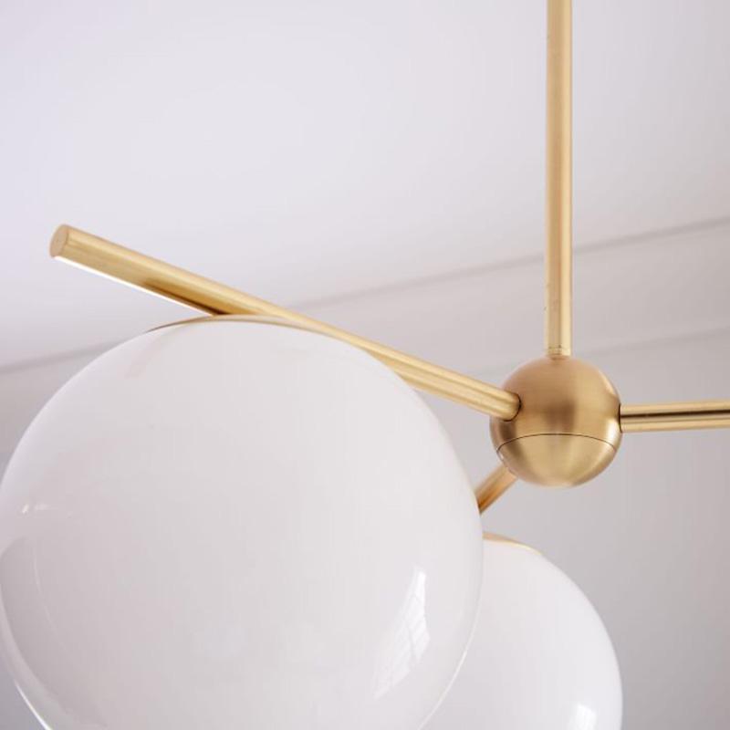 Casoella lámpara de araña esfera y tallo moderna dorada LED