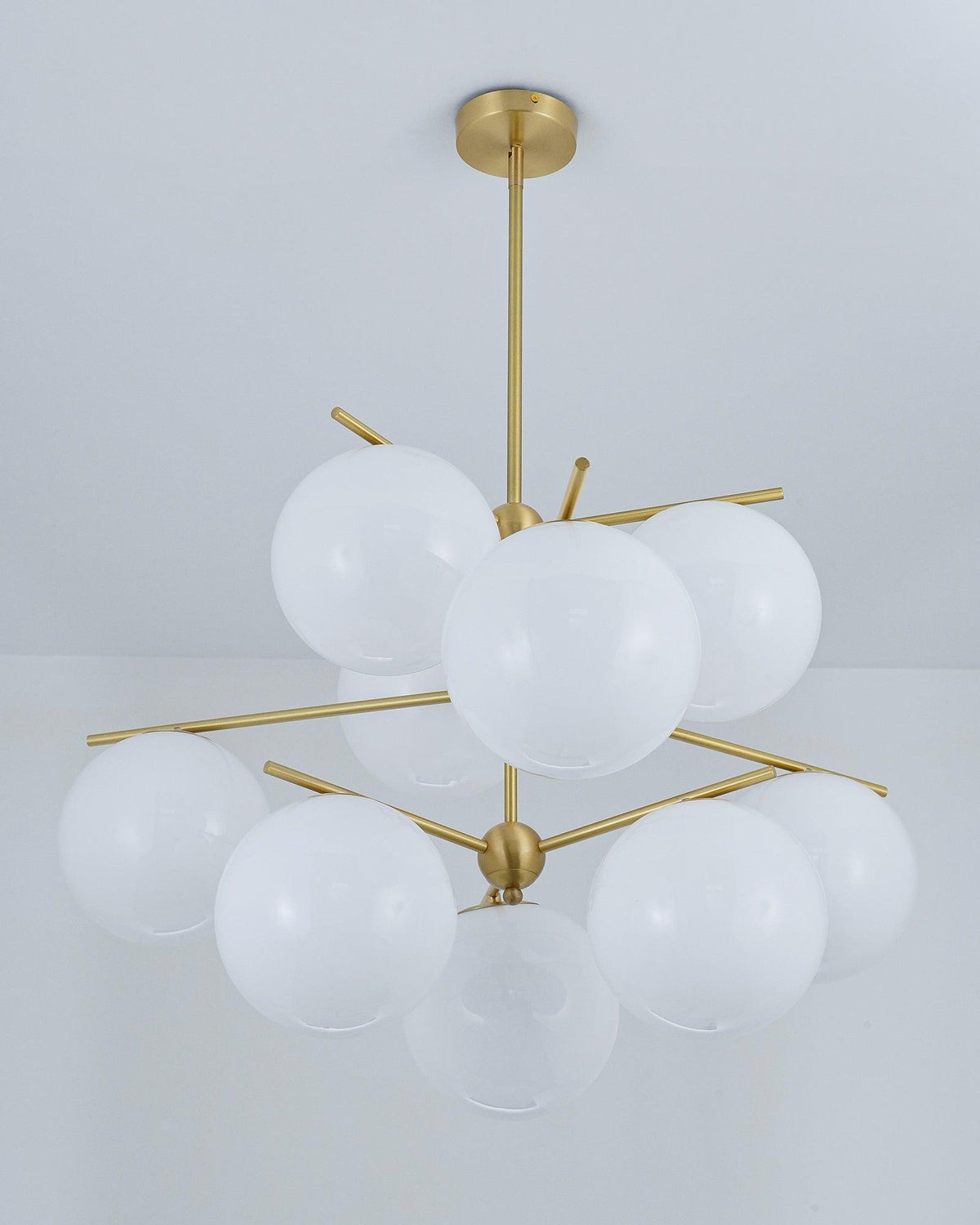 Casoella lámpara de araña esfera y tallo moderna dorada LED