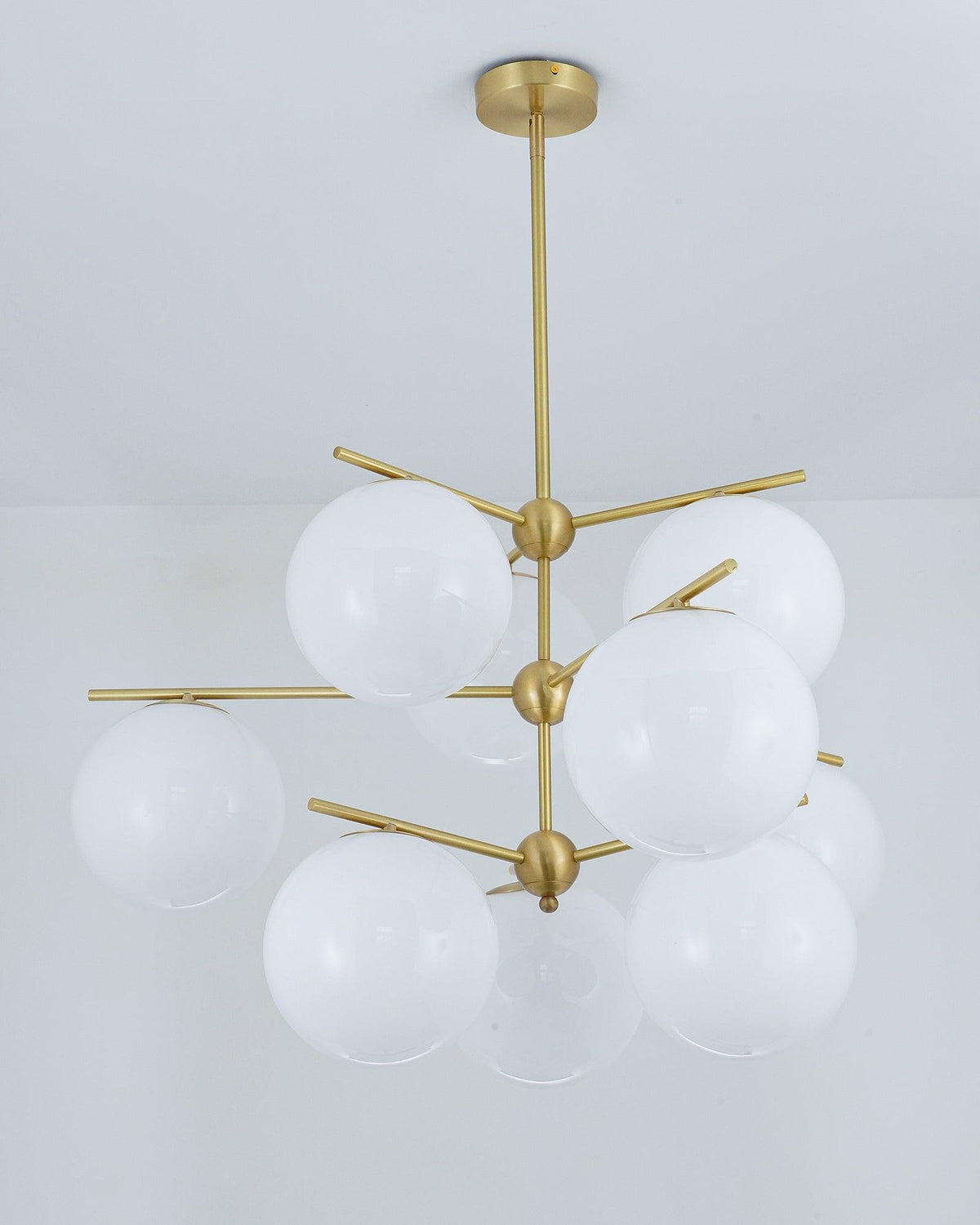 Casoella lámpara de araña esfera y tallo moderna dorada LED